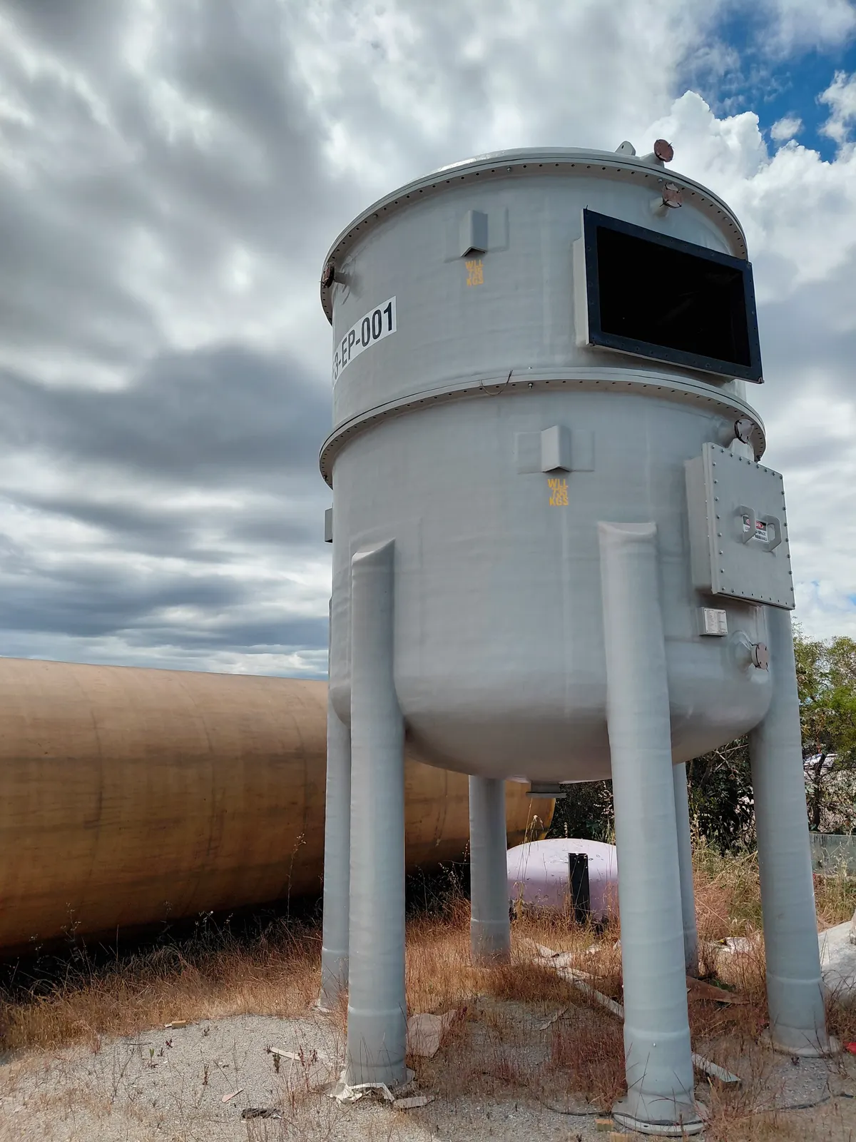 FRP process vessel on legs with a flanged side nozzle