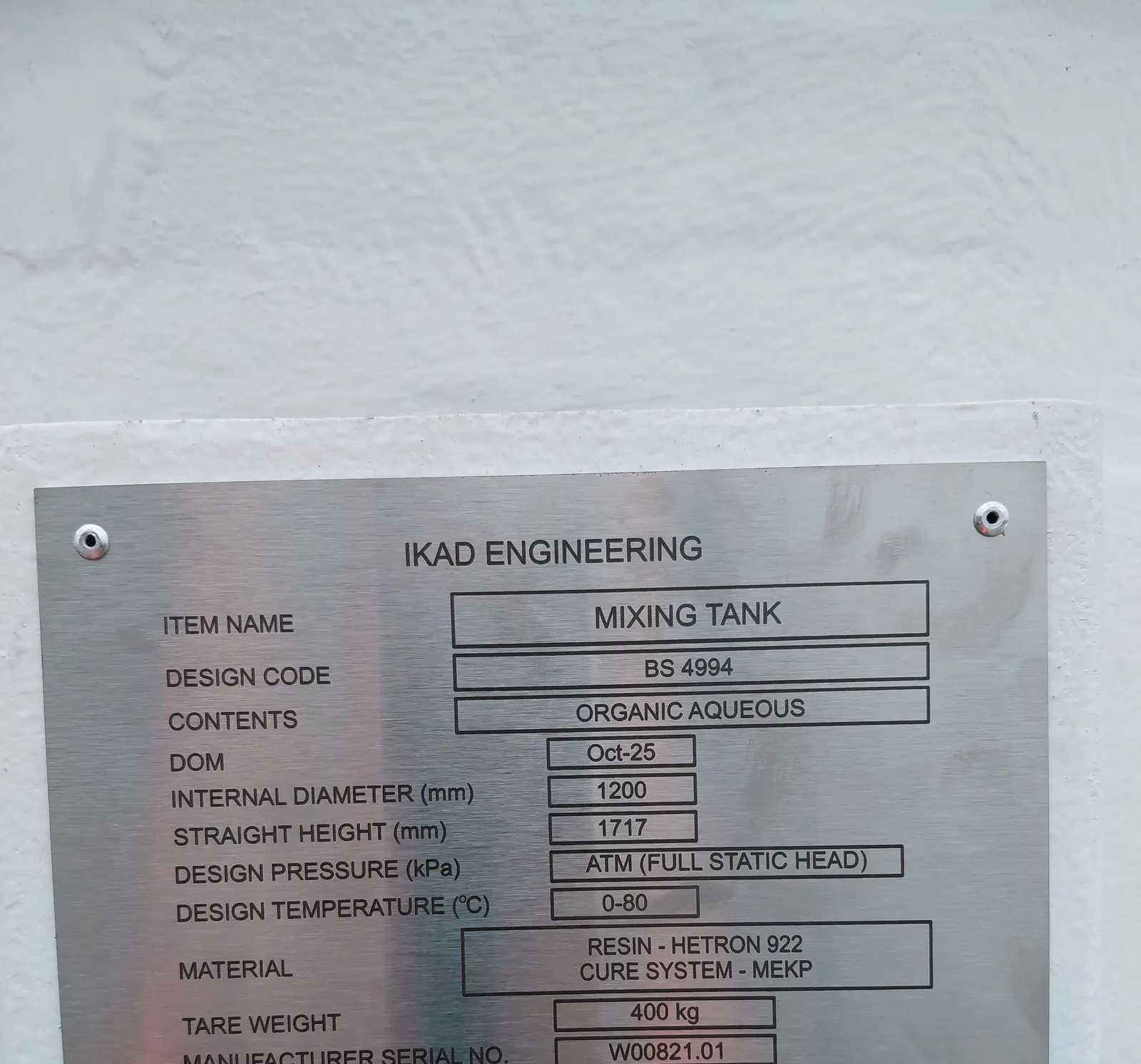 Stainless steel nameplate on a GRP mixing tank built to BS 4994
